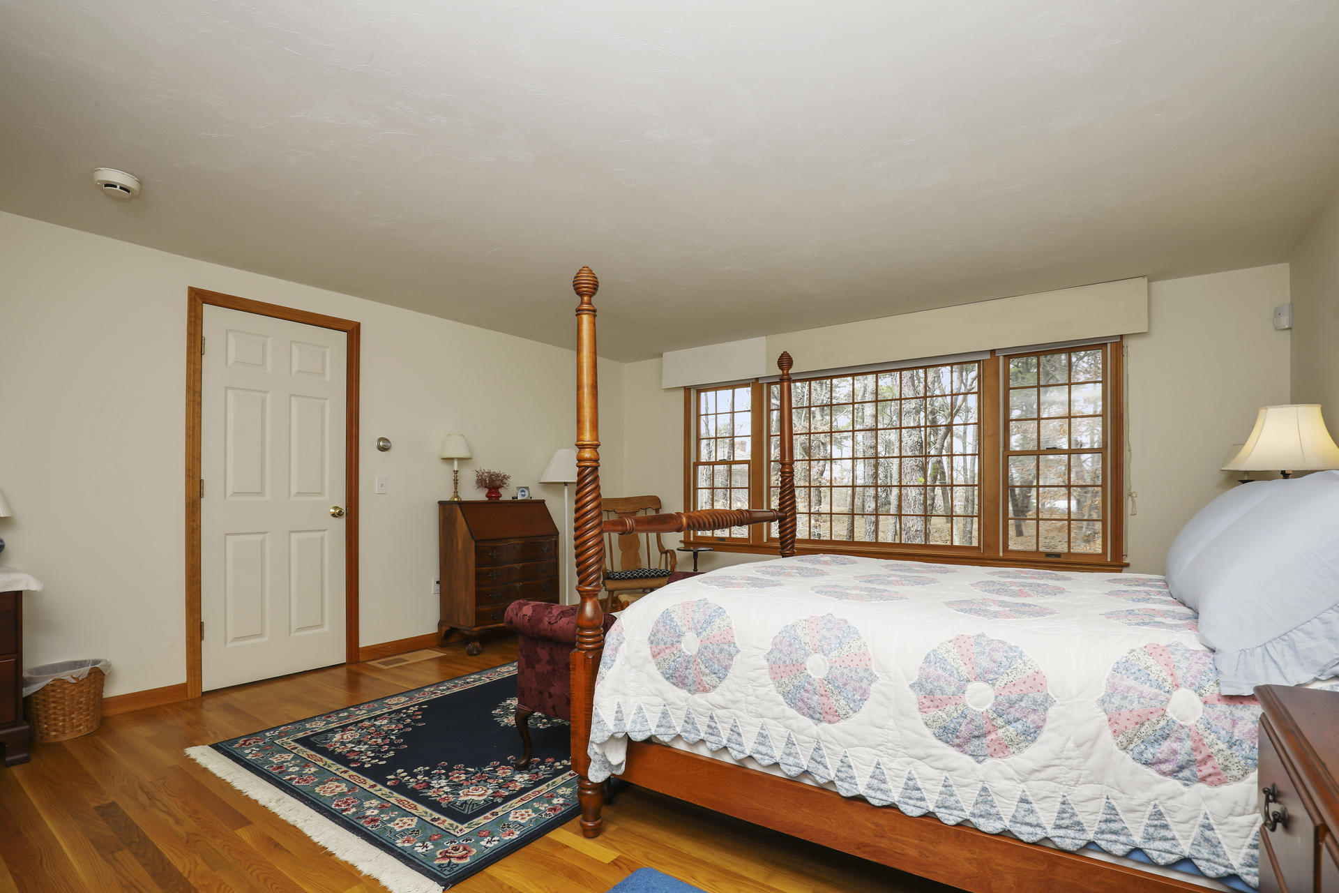 8 Clark's Point Road Eastham, MA 02642 - Photo 15 of 35 a bed sitting in a bedroom next to a window