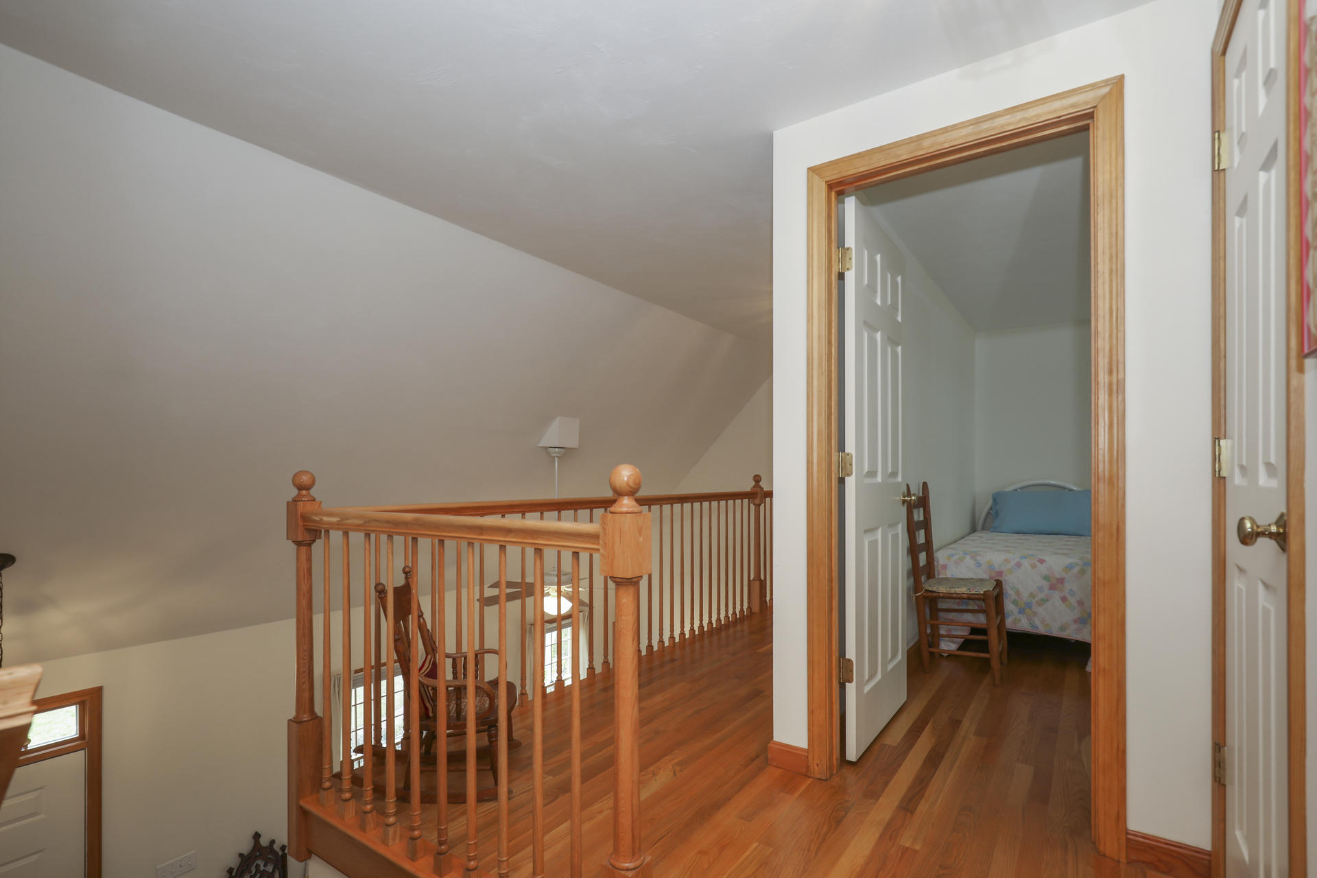 8 Clark's Point Road Eastham, MA 02642 - Photo 17 of 35 a view of a hallway with wooden floor and dining room