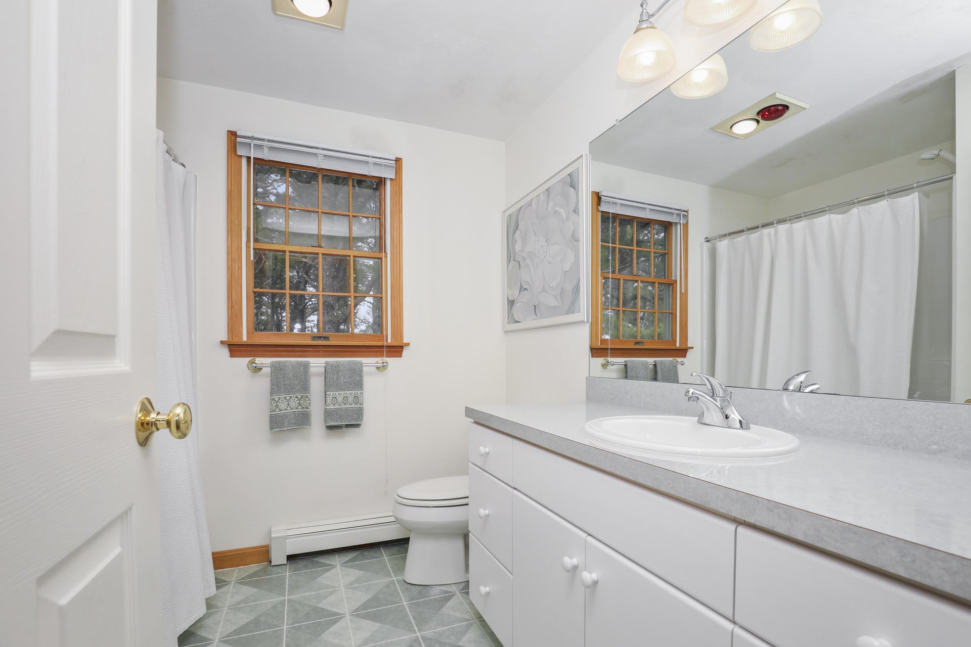 8 Clark's Point Road Eastham, MA 02642 - Photo 20 of 35 a bathroom with a sink toilet and shower