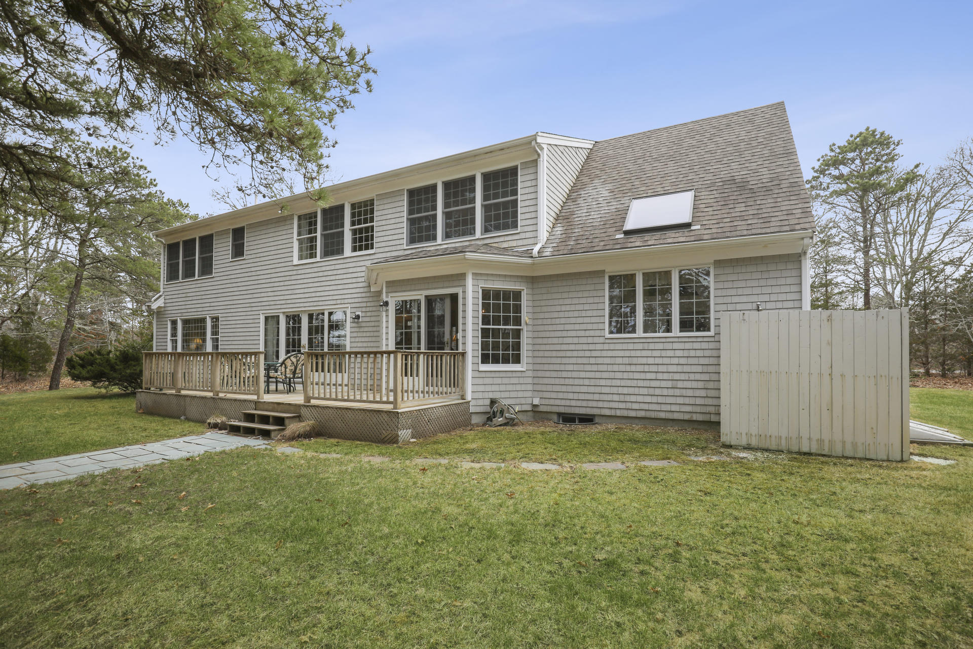 8 Clark's Point Road Eastham, MA 02642 - Photo 28 of 35 a front view of a house with a yard