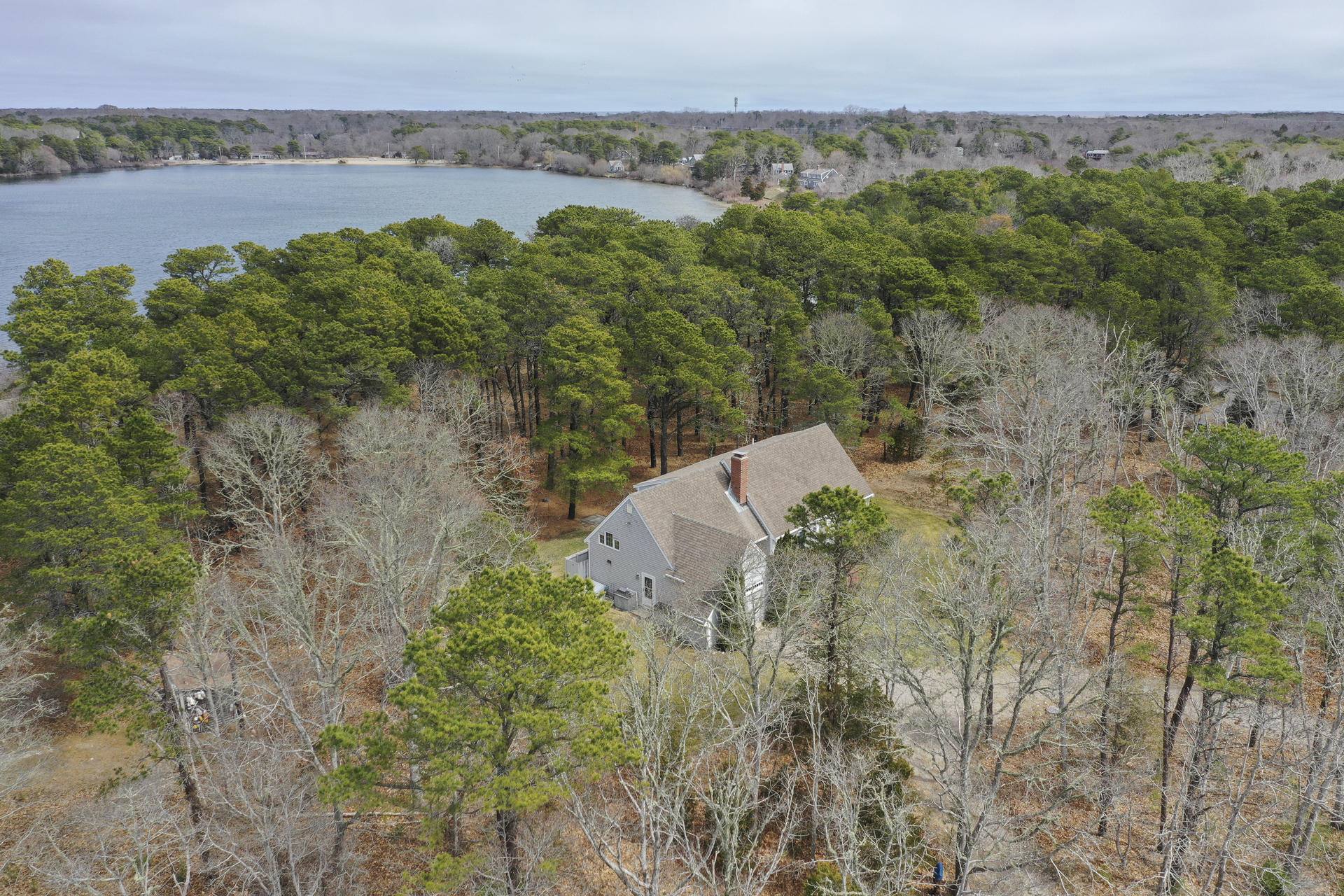 8 Clark's Point Road Eastham, MA 02642 - Photo 3 of 35 a view of a lake with a mountain in the back