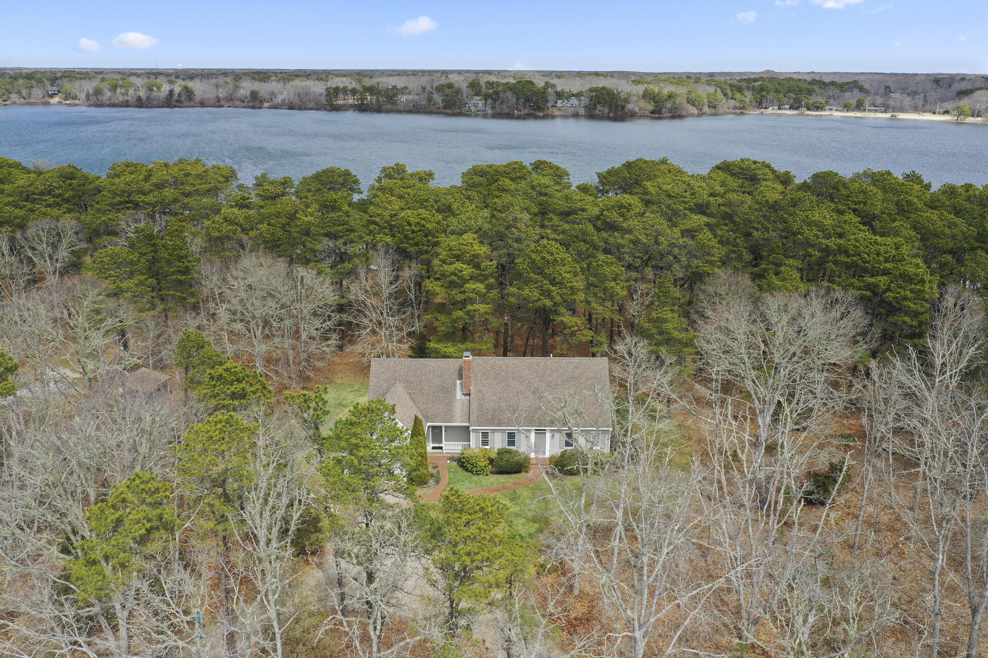 8 Clark's Point Road Eastham, MA 02642 - Photo 4 of 35 a view of a house with a lake view