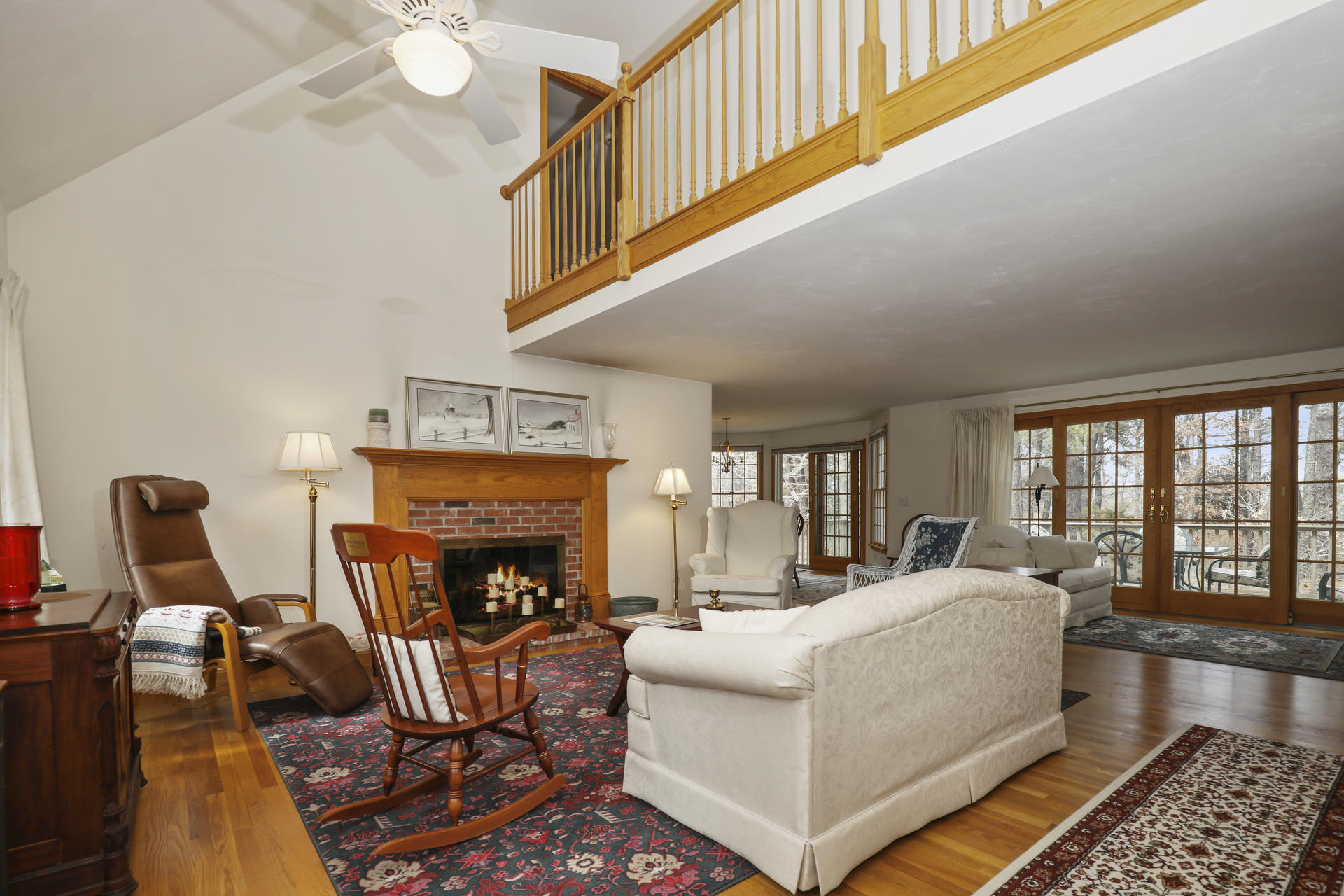 8 Clark's Point Road Eastham, MA 02642 - Photo 7 of 35 a living room with furniture fireplace and flat screen tv