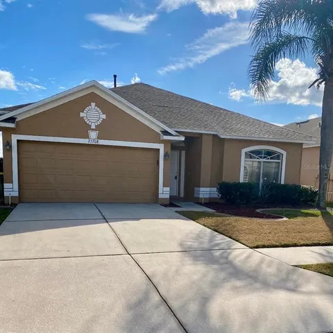 a front view of a house with yard