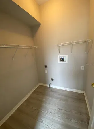 a view of a room with racks on the wall