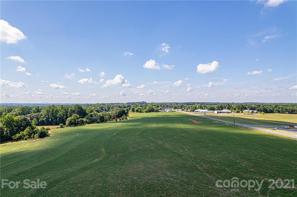 3812 2 Fallston Road Shelby, NC 28150 - Photo 8 of 12 a view of a green field with clear sky