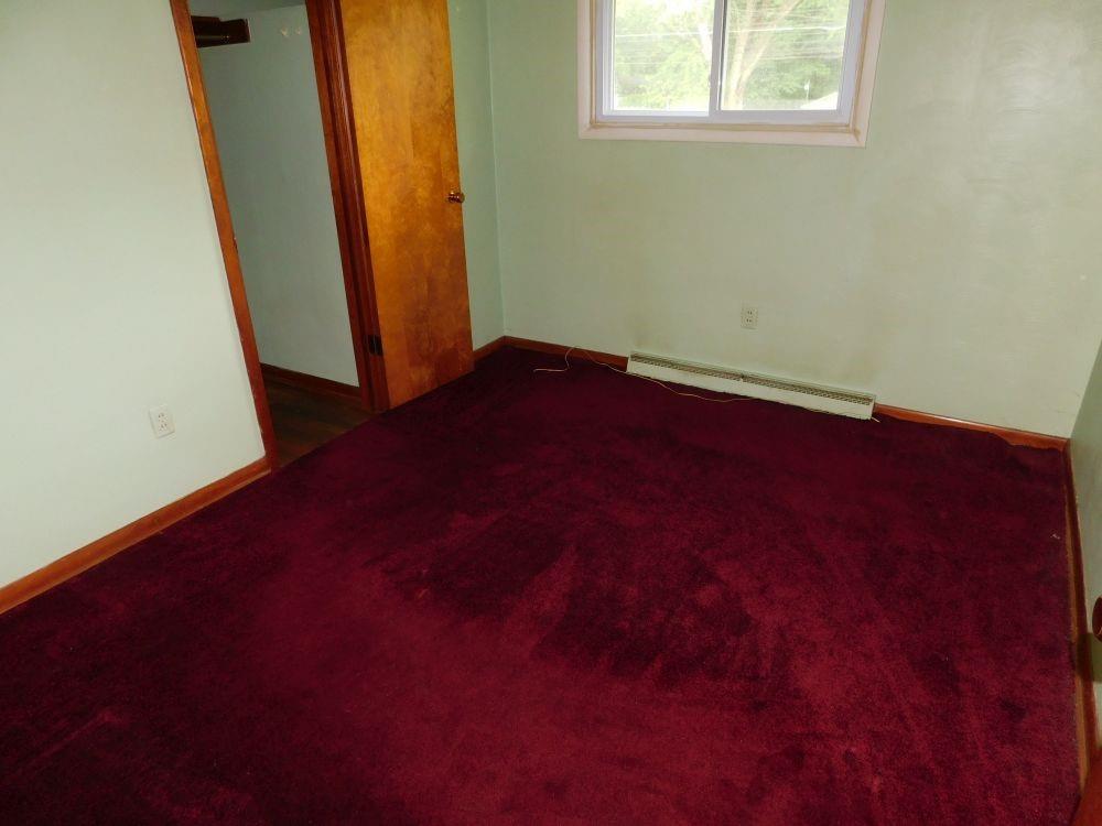 443 Fairview Road Fredonia, PA 16124 - Photo 4 of 12 an empty room with a window