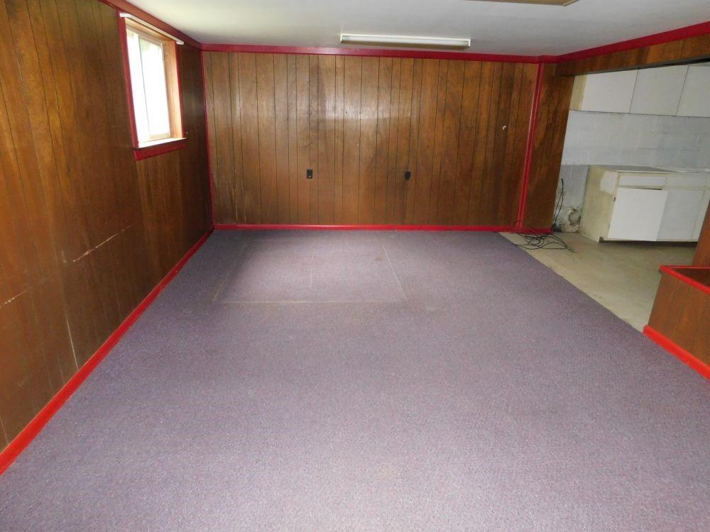443 Fairview Road Fredonia, PA 16124 - Photo 8 of 12 a view of an empty room with a window