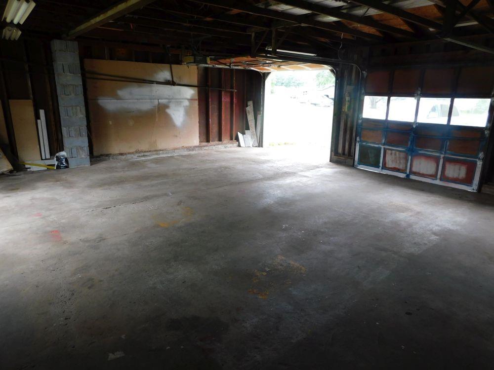 443 Fairview Road Fredonia, PA 16124 - Photo 9 of 12 a view of an empty room with a fireplace