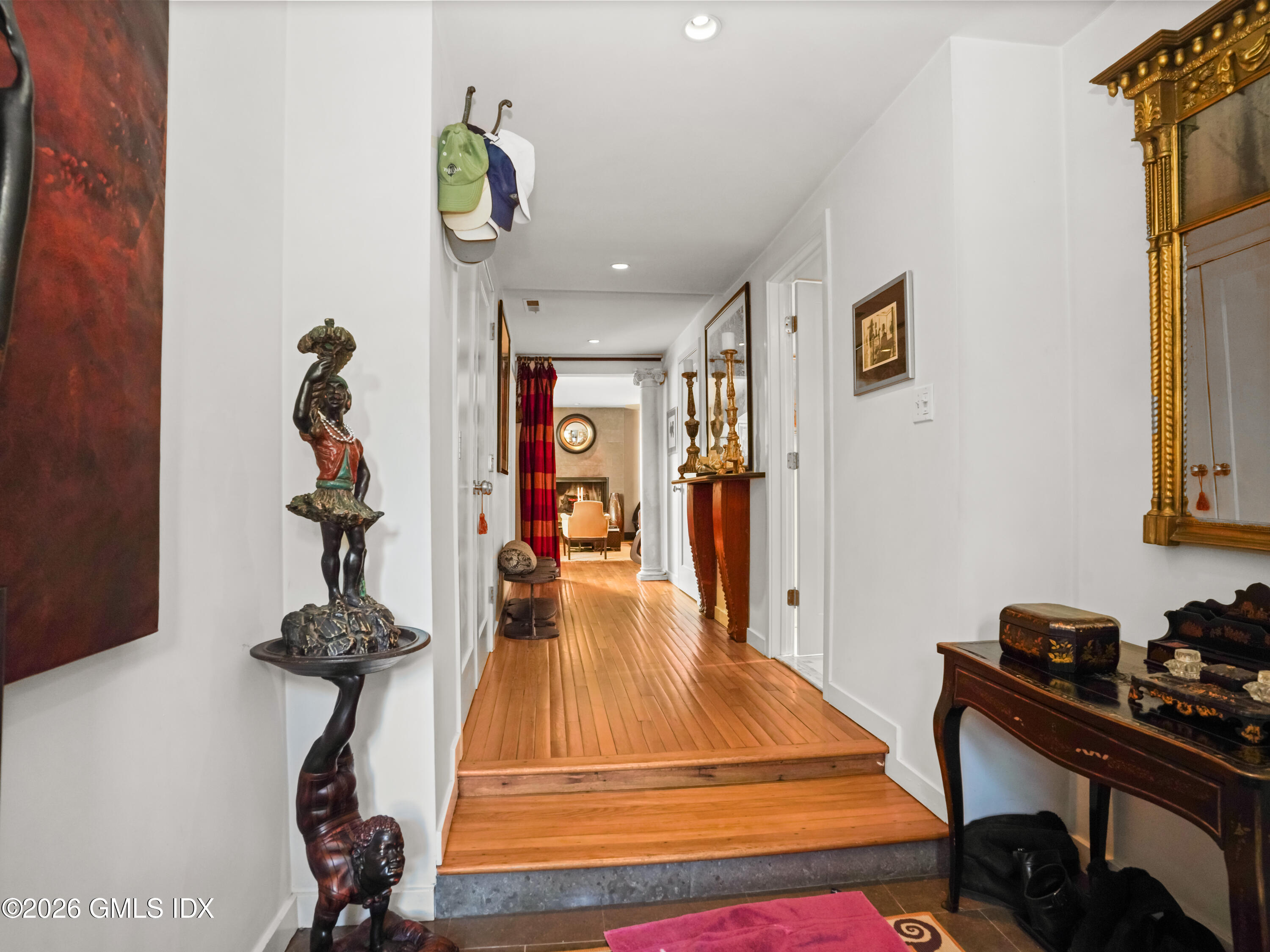 332 Riversville Road Greenwich, CT 06831 - Photo 12 of 22 a room with gym equipment and a chandelier