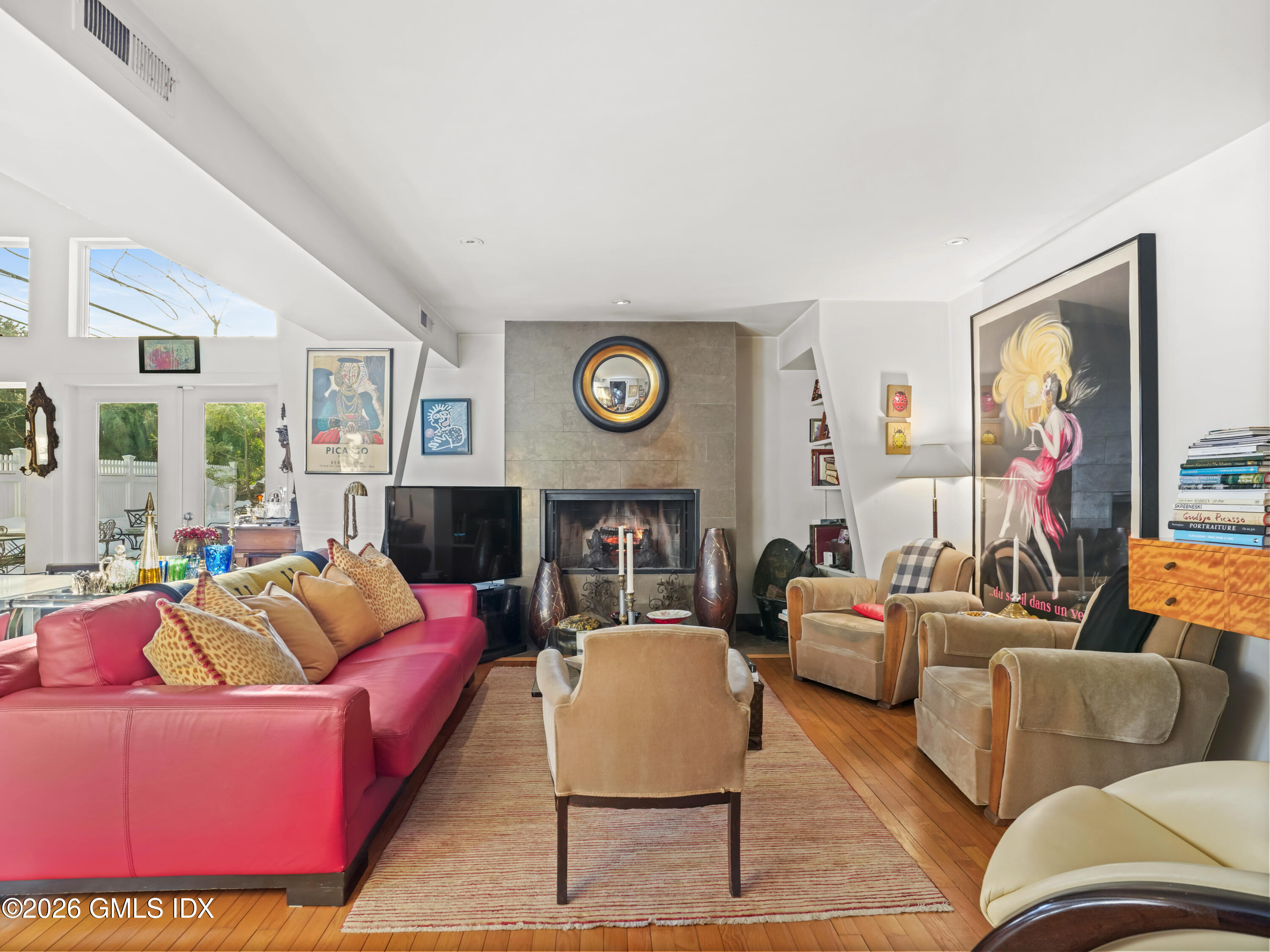332 Riversville Road Greenwich, CT 06831 - Photo 13 of 22 a living room with furniture and a fireplace