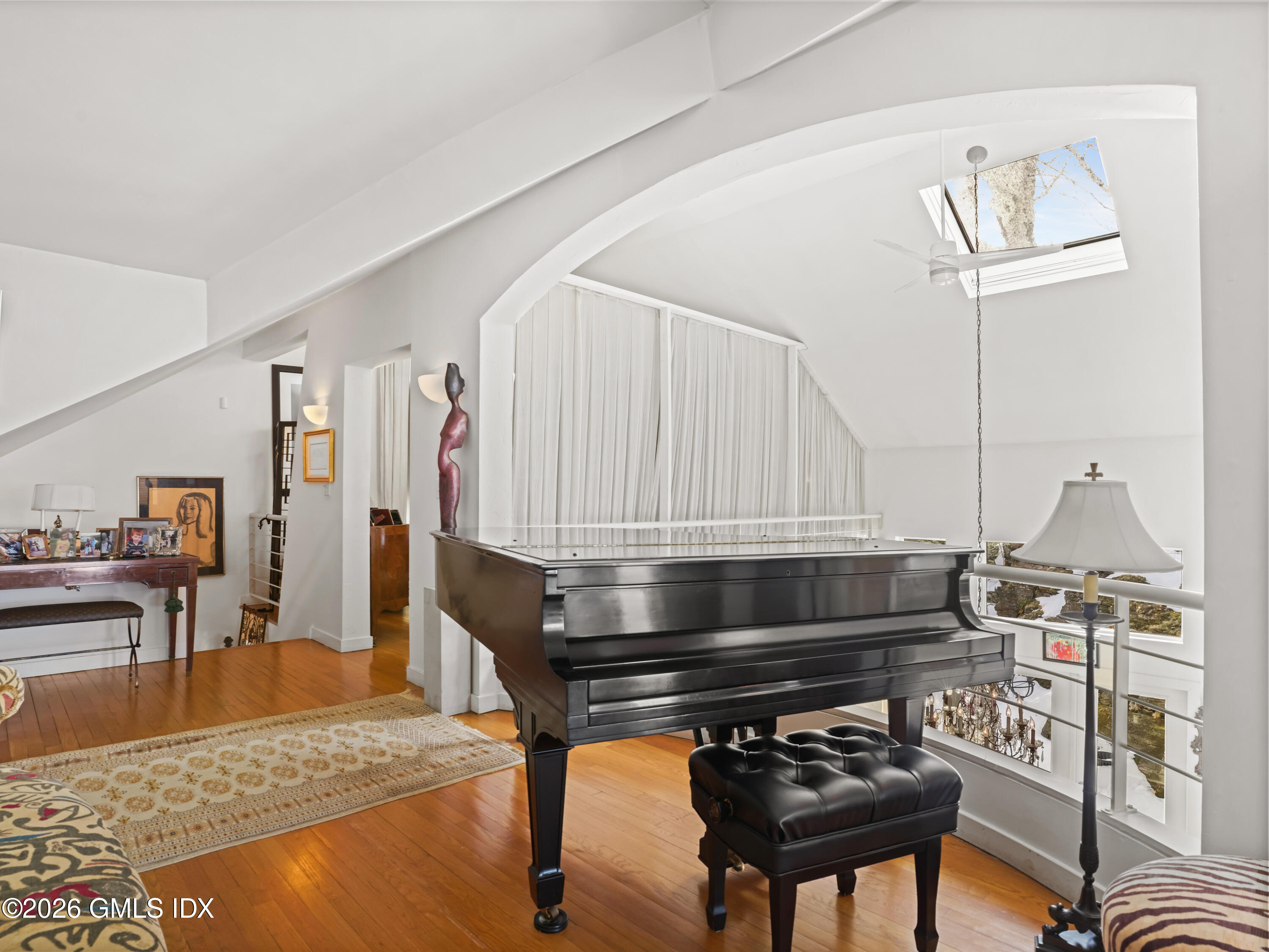 332 Riversville Road Greenwich, CT 06831 - Photo 19 of 22 a living room with furniture and a wooden floor