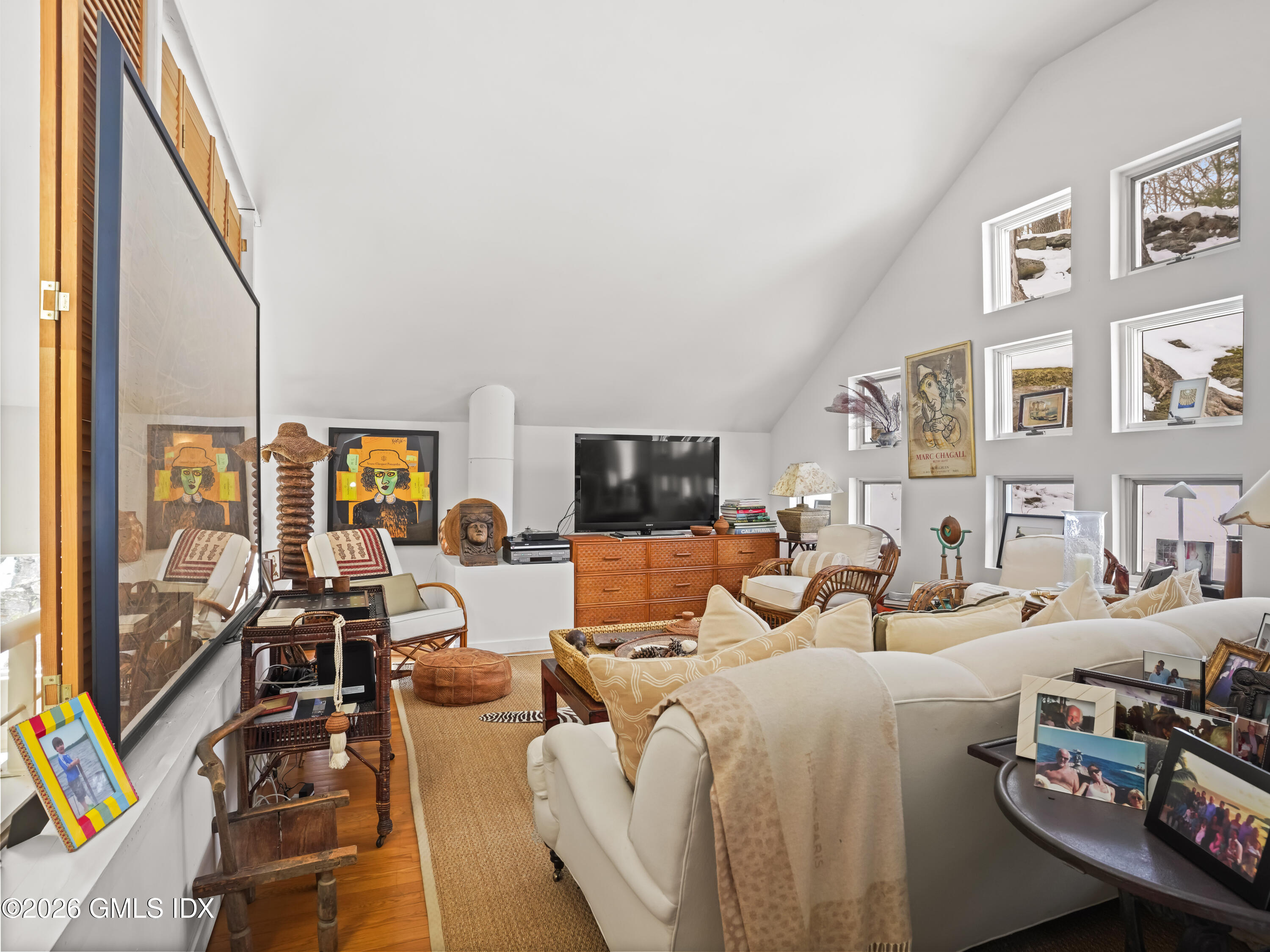 332 Riversville Road Greenwich, CT 06831 - Photo 20 of 22 a living room with furniture and a flat screen tv