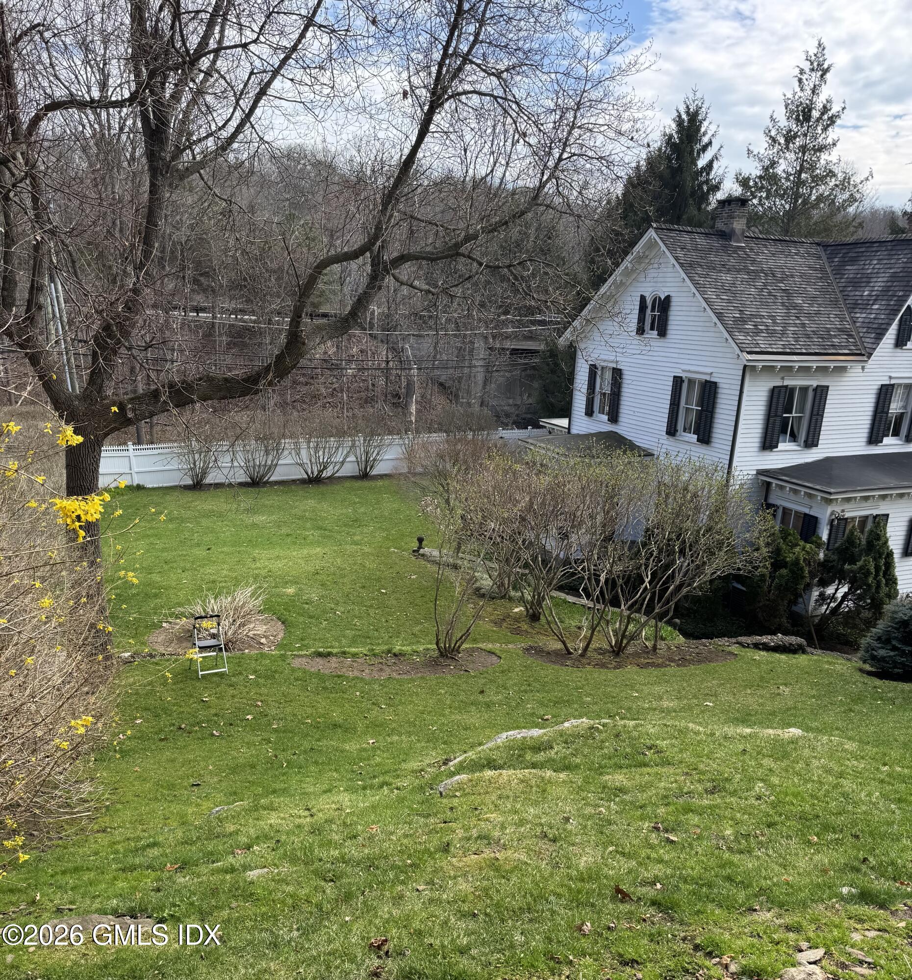 332 Riversville Road Greenwich, CT 06831 - Photo 3 of 22 a aerial view of a house with yard and green space
