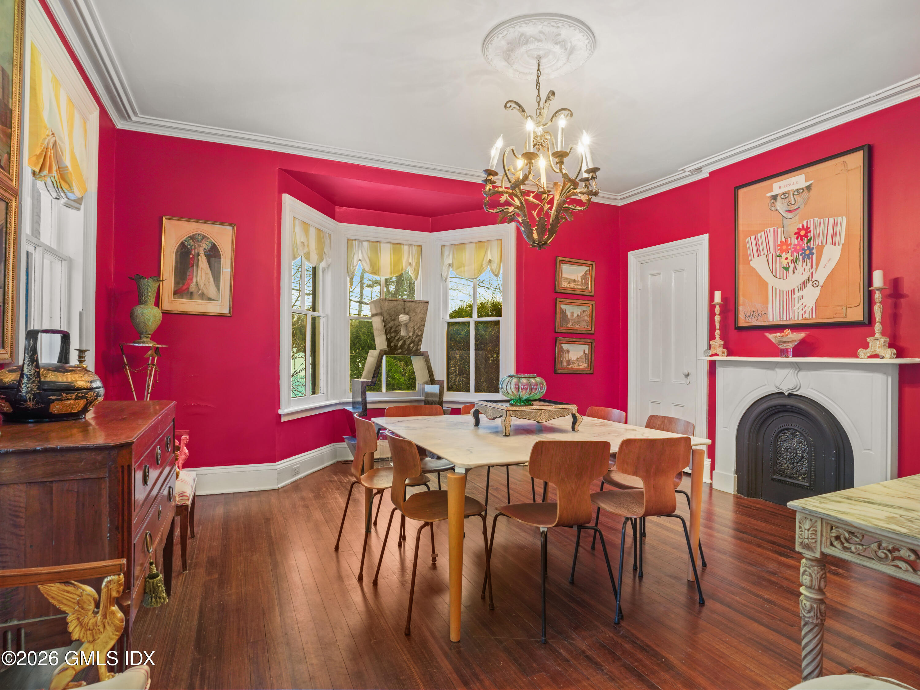 332 Riversville Road Greenwich, CT 06831 - Photo 7 of 22 a view of a dining room with furniture a chandelier and wooden floor