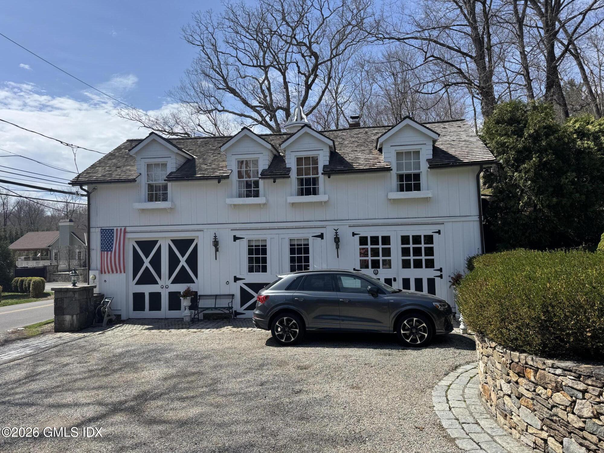 332 Riversville Road Greenwich, CT 06831 - Photo 10 of 22 a view of a car park in front of house