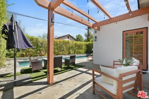 a building outdoor space with patio furniture