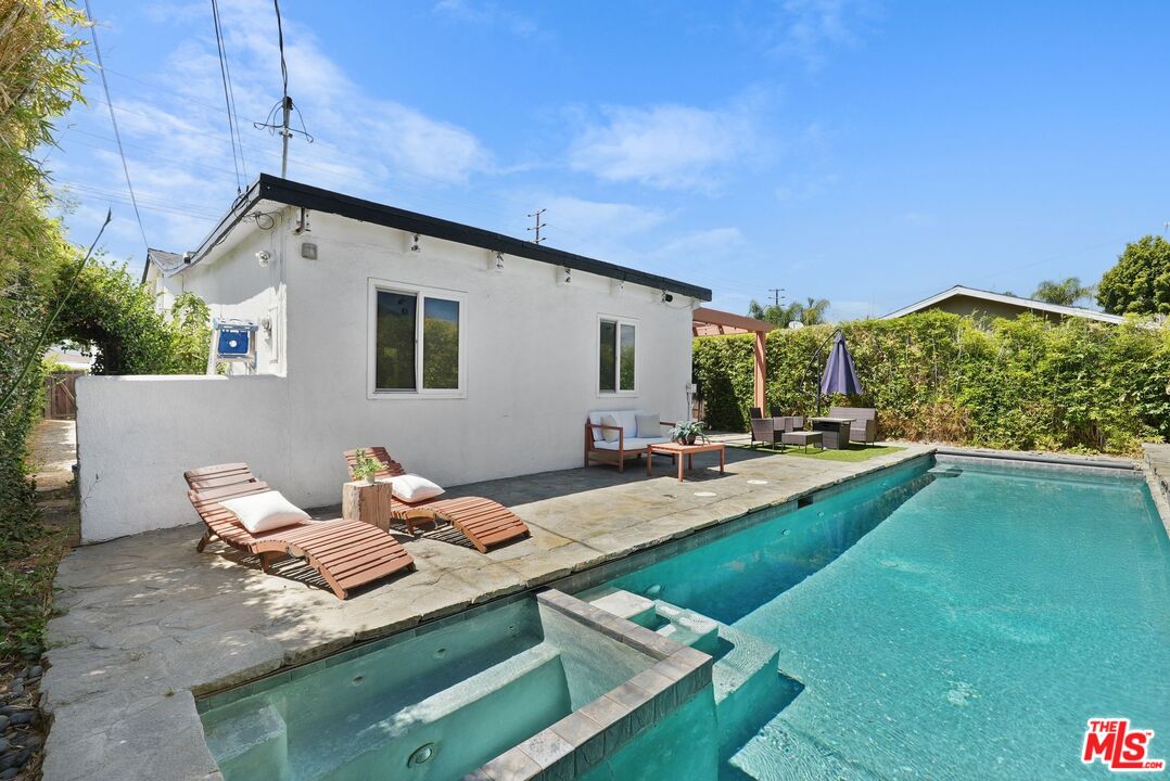 5350 Fallbrook Avenue Woodland Hills, CA 91367 - Photo 24 of 25 a view of swimming pool with outdoor seating and plants