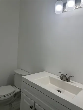 a view of a building with a garden and plants