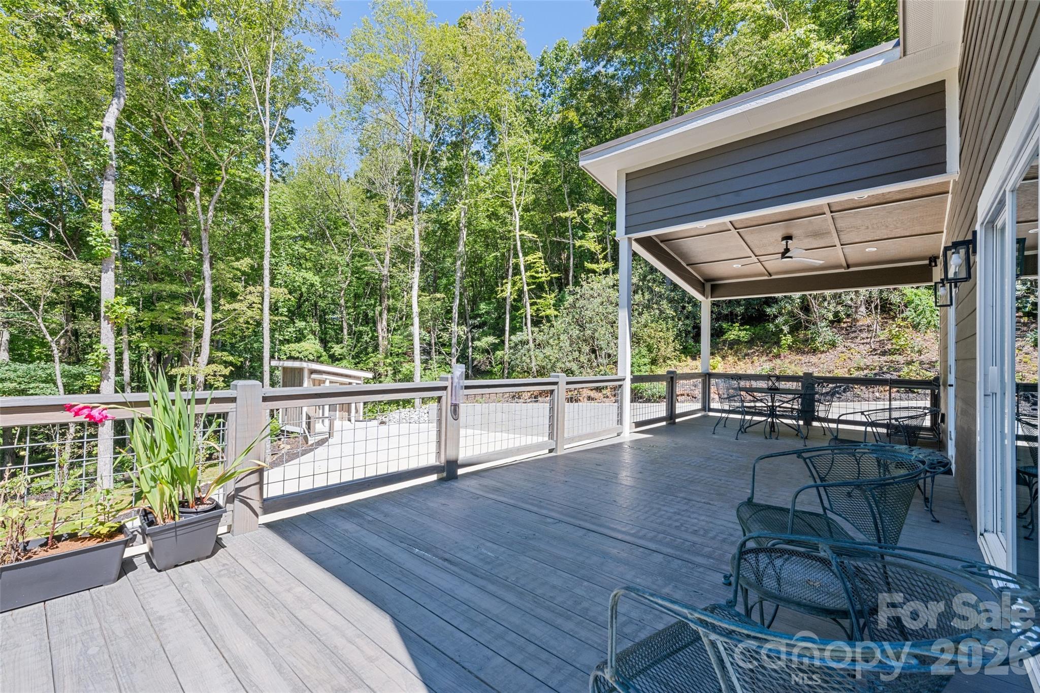 1185 Wallalieu Road Otto, NC 28763 - Photo 7 of 43 a view of a chairs and table in the balcony