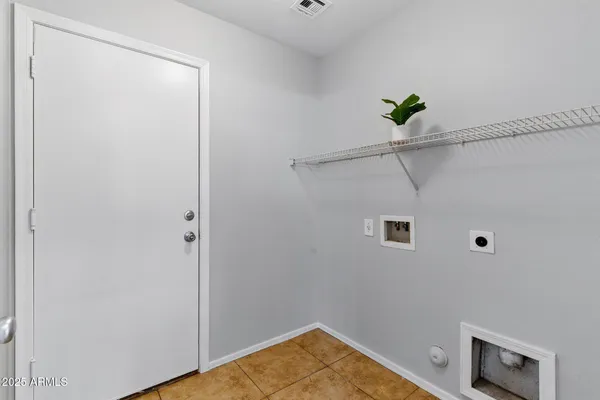 a view of a hallway with closet