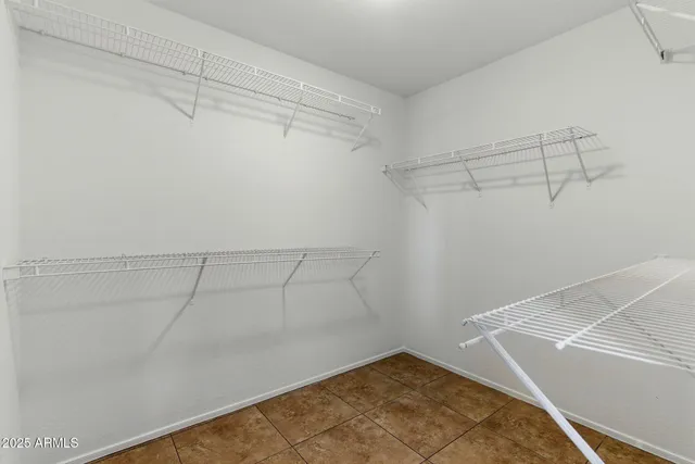 a view of a room with racks on the wall