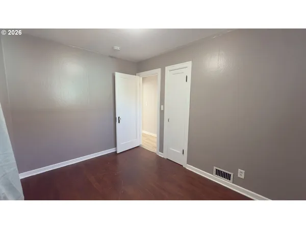 a black and white photo of a living room