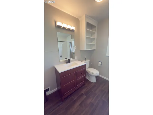 a bathroom with a shower and a bath tub