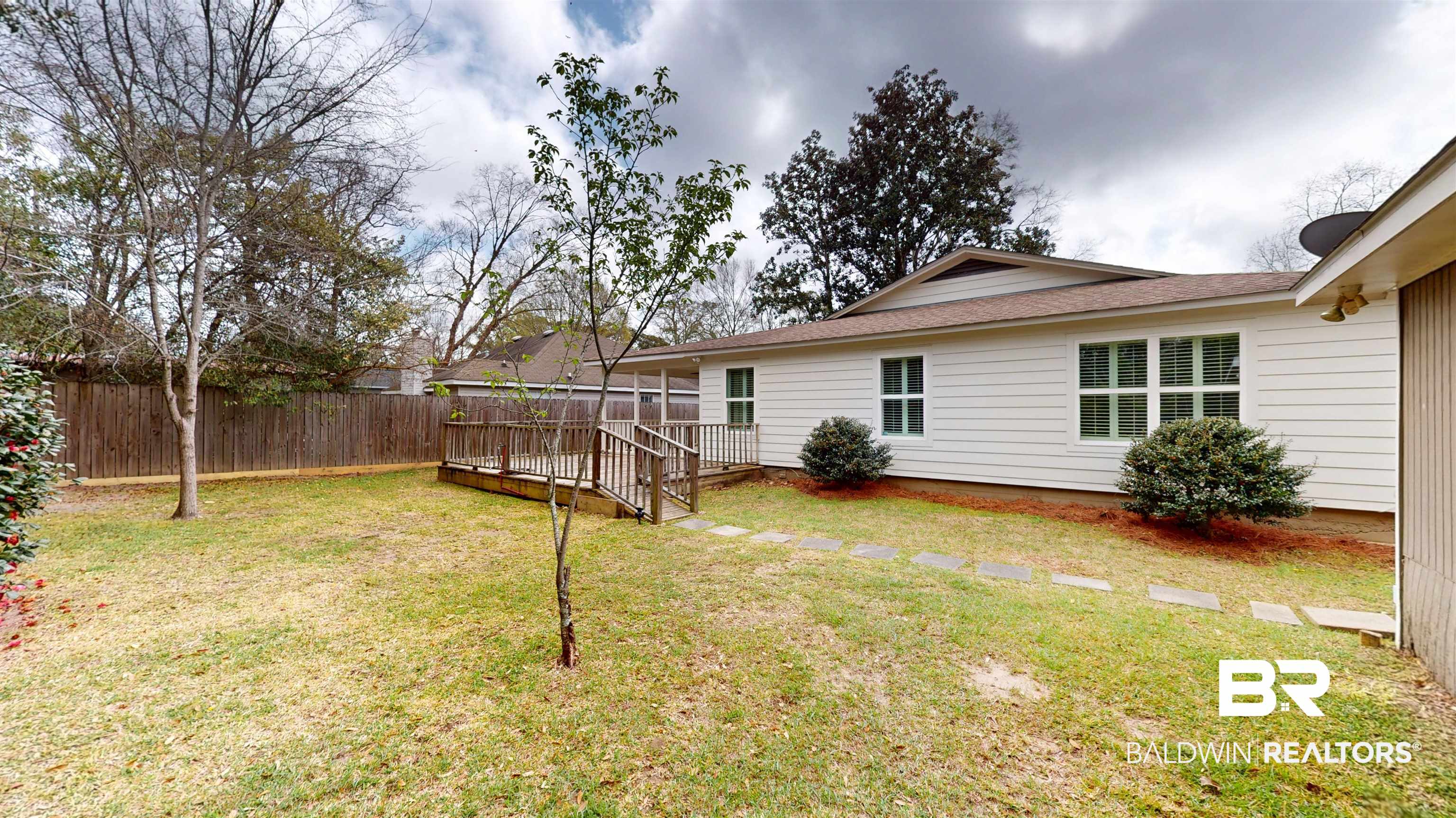 8 Lancaster Road Mobile, AL 36608 - Photo 22 of 24 Fenced backyard featuring a deck