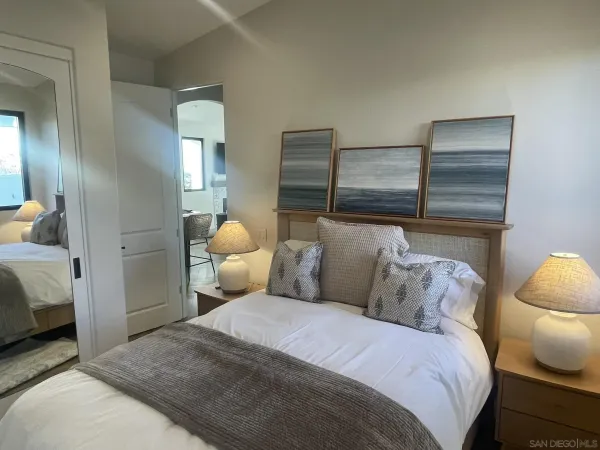 a bedroom with a bed and closet