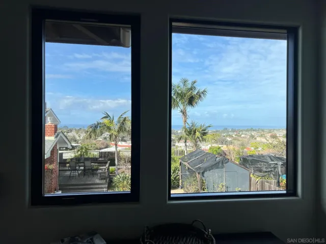 a view of a large window with an outdoor view