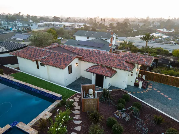 an aerial view of a house with a garden