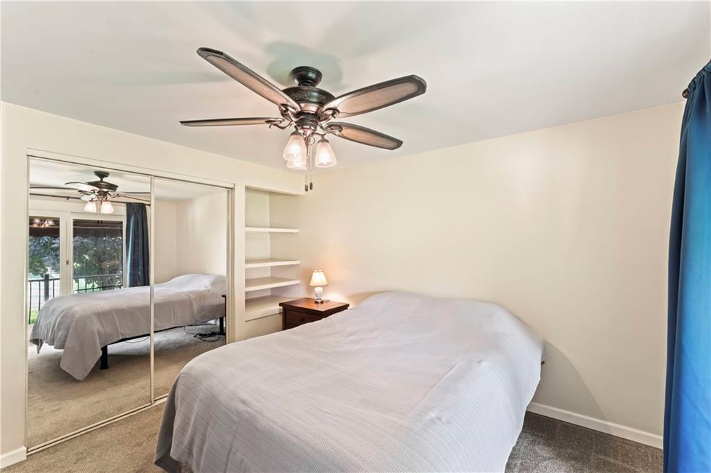 19 Ellen Drive McKees Rocks, PA 15136 - Photo 11 of 38 a bedroom with two beds and a large window