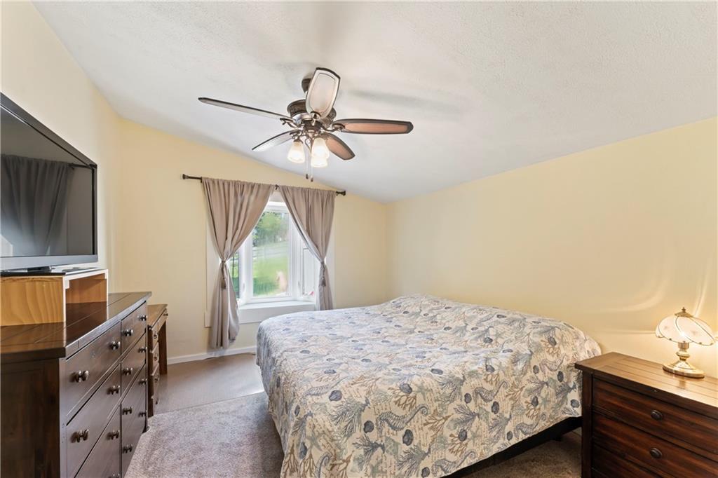 19 Ellen Drive McKees Rocks, PA 15136 - Photo 13 of 38 a bedroom with a bed and a window