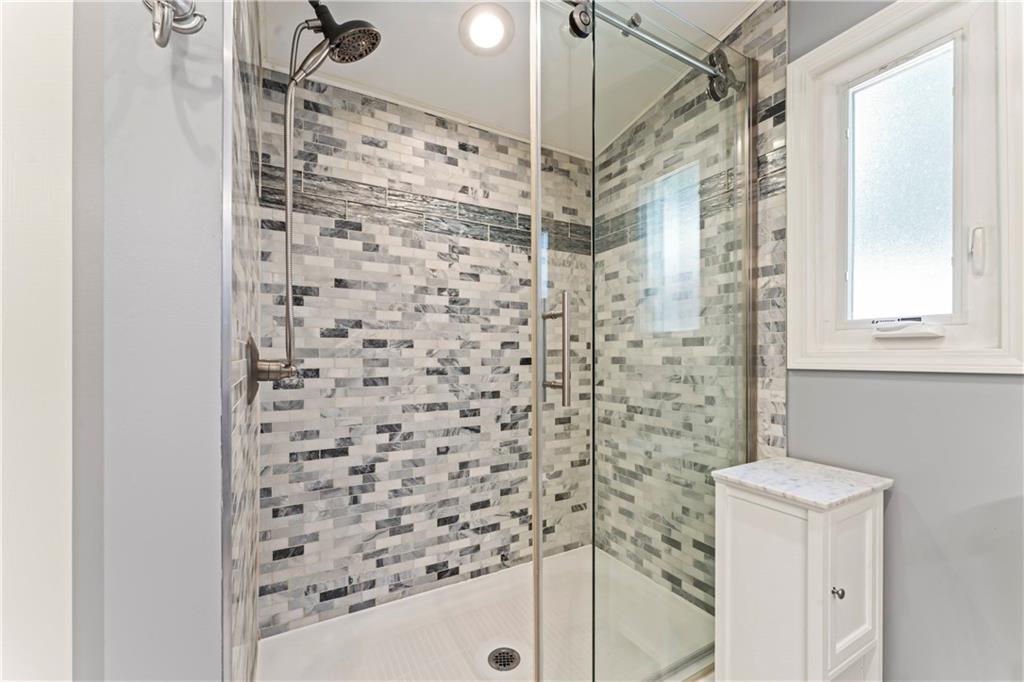 19 Ellen Drive McKees Rocks, PA 15136 - Photo 17 of 38 a bathroom with a shower and a sink