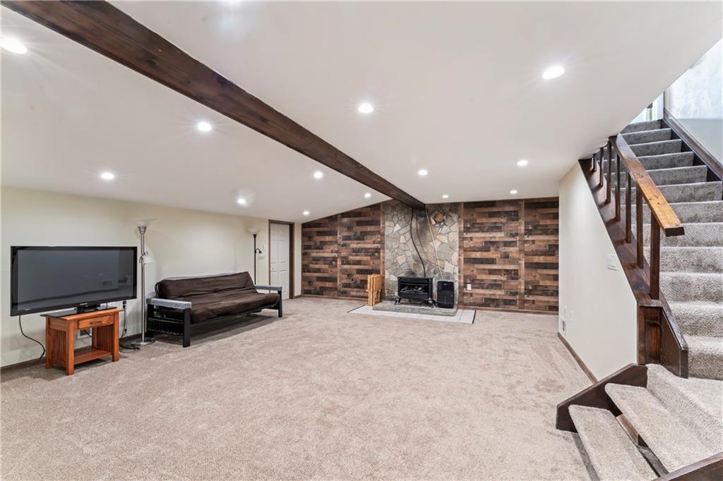 19 Ellen Drive McKees Rocks, PA 15136 - Photo 19 of 38 a living room with furniture and a flat screen tv