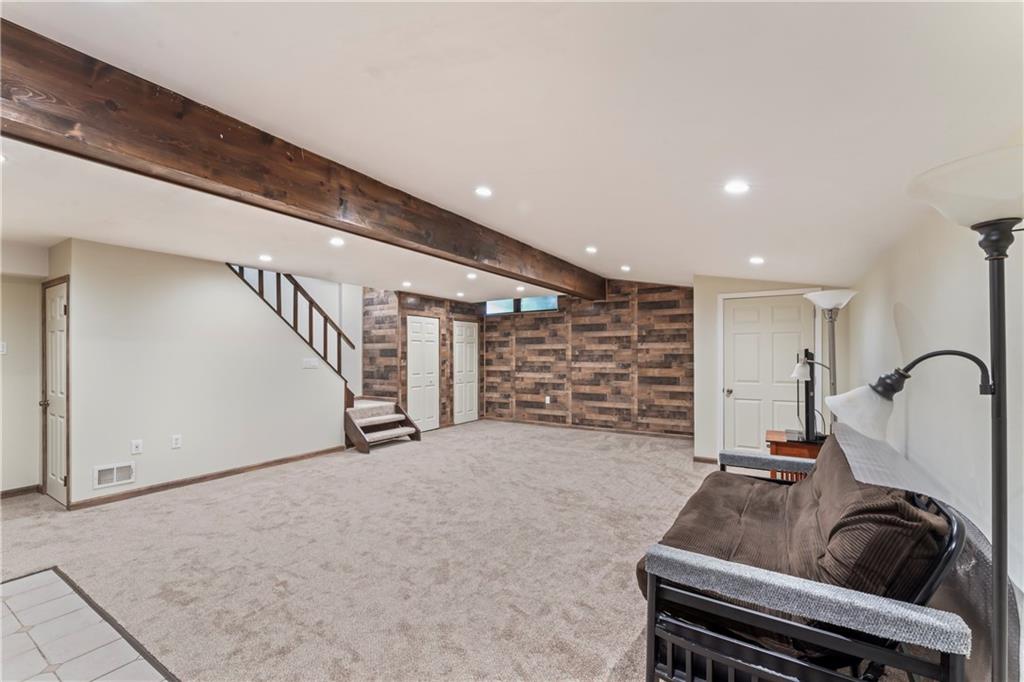 19 Ellen Drive McKees Rocks, PA 15136 - Photo 20 of 38 a view of a livingroom with furniture and staircase