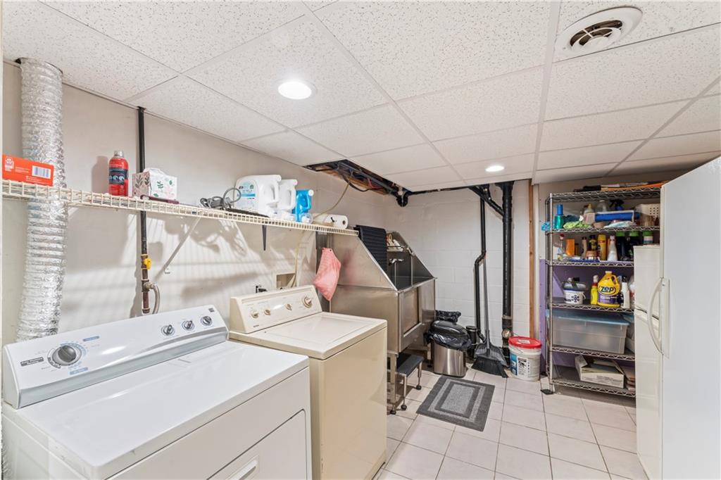 19 Ellen Drive McKees Rocks, PA 15136 - Photo 23 of 38 a utility room with dryer and washer