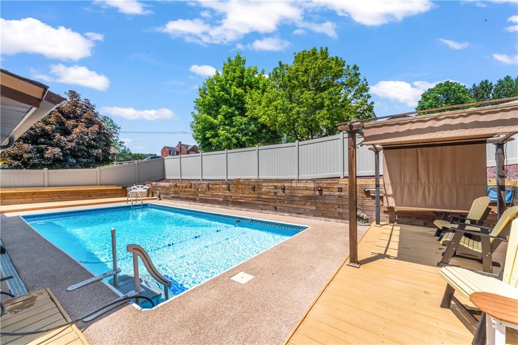 19 Ellen Drive McKees Rocks, PA 15136 - Photo 25 of 38 a view of a swimming pool with chairs