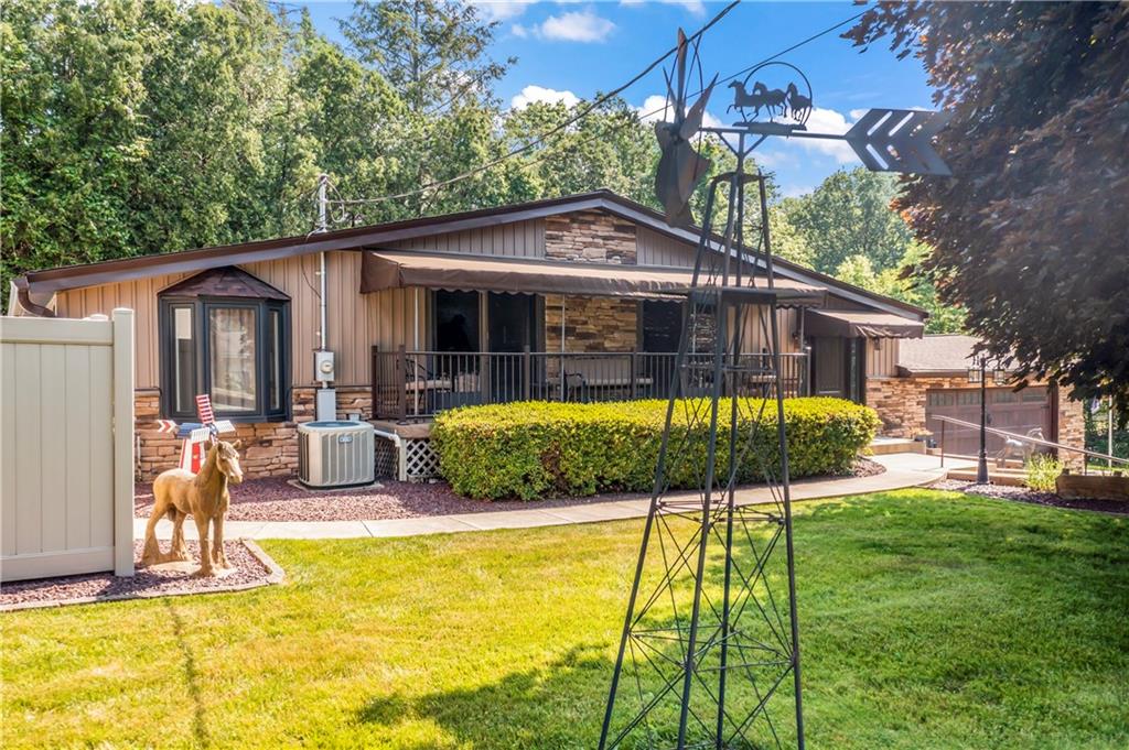19 Ellen Drive McKees Rocks, PA 15136 - Photo 35 of 38 a view of a house with a backyard patio and swimming pool