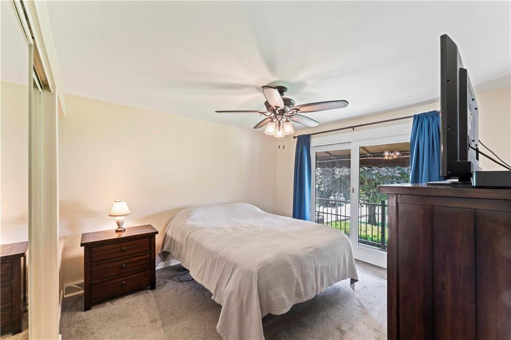 19 Ellen Drive McKees Rocks, PA 15136 - Photo 10 of 38 a bedroom with a bed and a window