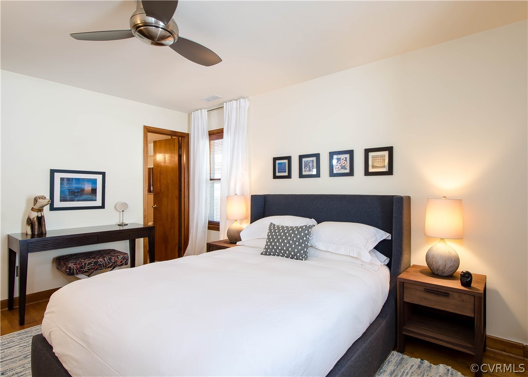 5013 Devonshire Road Richmond, VA 23225 - Photo 9 of 20 The master bedroom has hardwood flooring, three cl