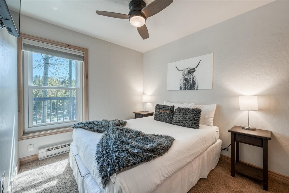 200 North Ridge Street, Unit R A Breckenridge, CO 80424 - Photo 20 of 38 a bedroom with a bed and a window