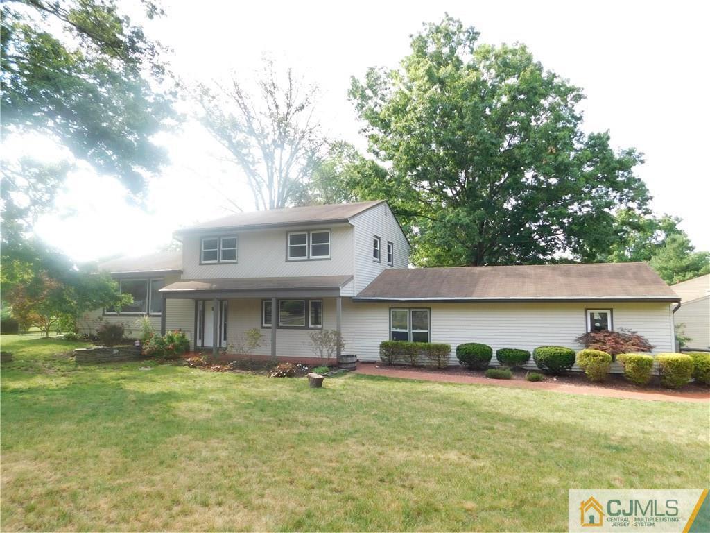 1 Perry Road East Brunswick, NJ 08816 - Photo 1 of 18 a view of a yard in front of house