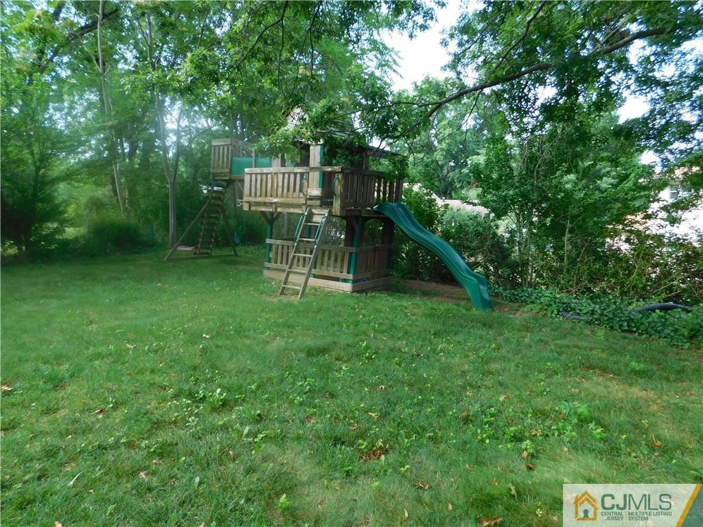 1 Perry Road East Brunswick, NJ 08816 - Photo 18 of 18 a view of a house with a backyard