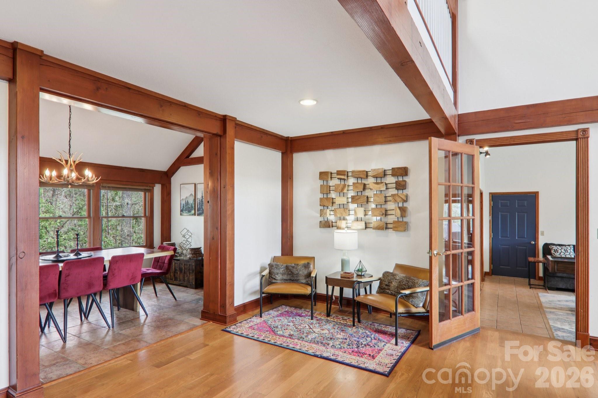 28 Nantahala Ridge Bryson City, NC 28713 - Photo 22 of 47 a living room with furniture a rug and a large window