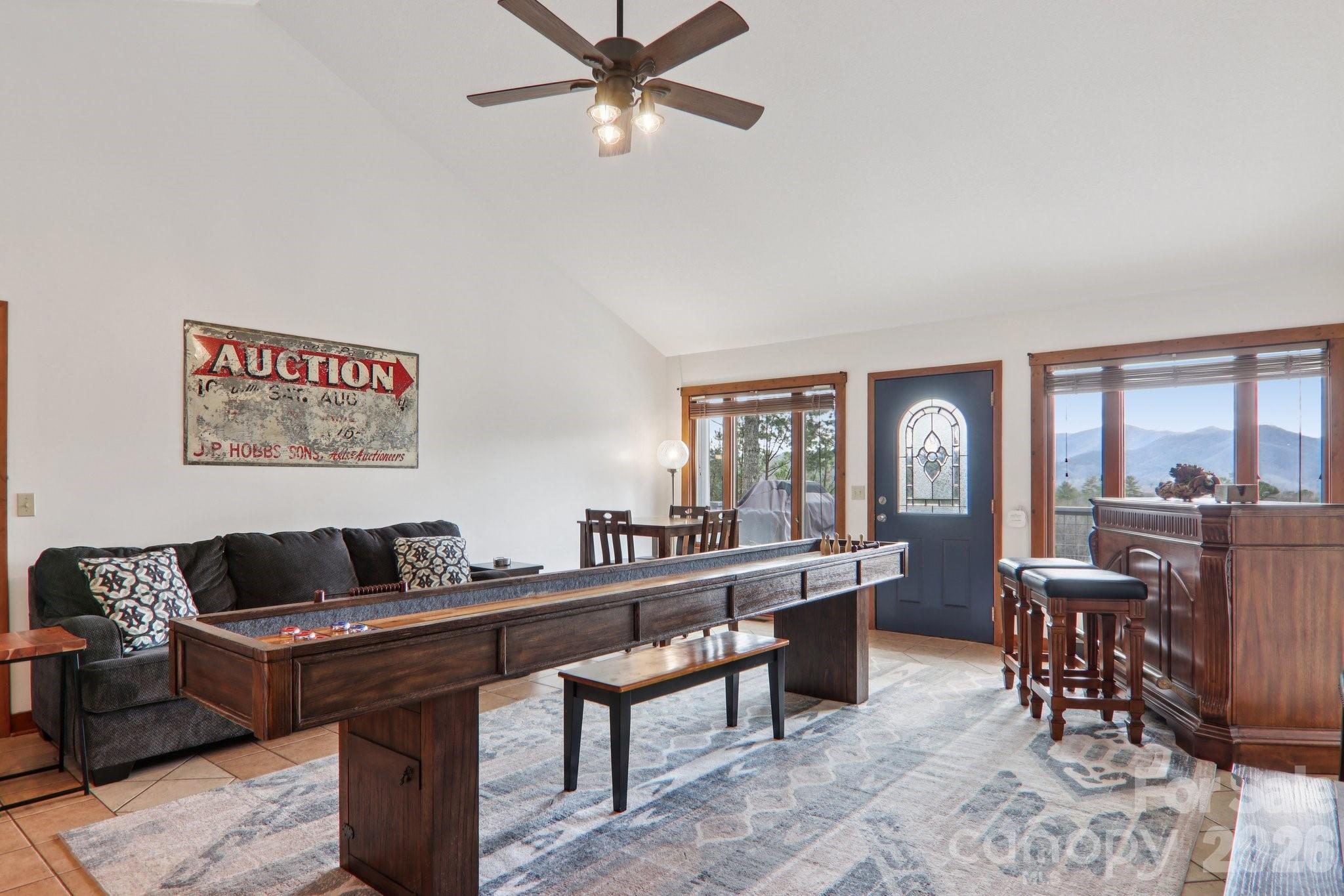 28 Nantahala Ridge Bryson City, NC 28713 - Photo 29 of 47 a living room with furniture a rug and a large window