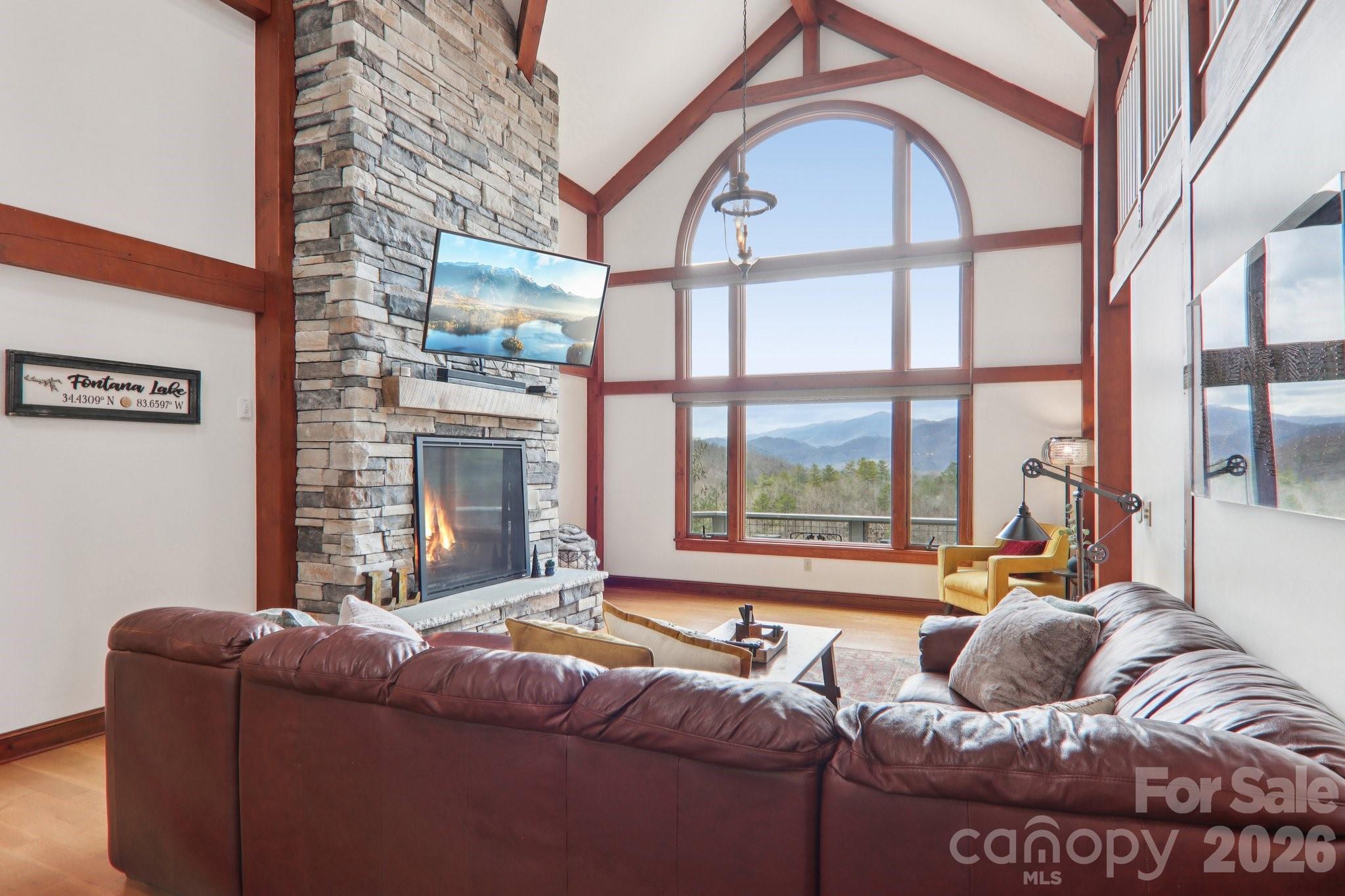 28 Nantahala Ridge Bryson City, NC 28713 - Photo 3 of 47 a living room with furniture and a large window