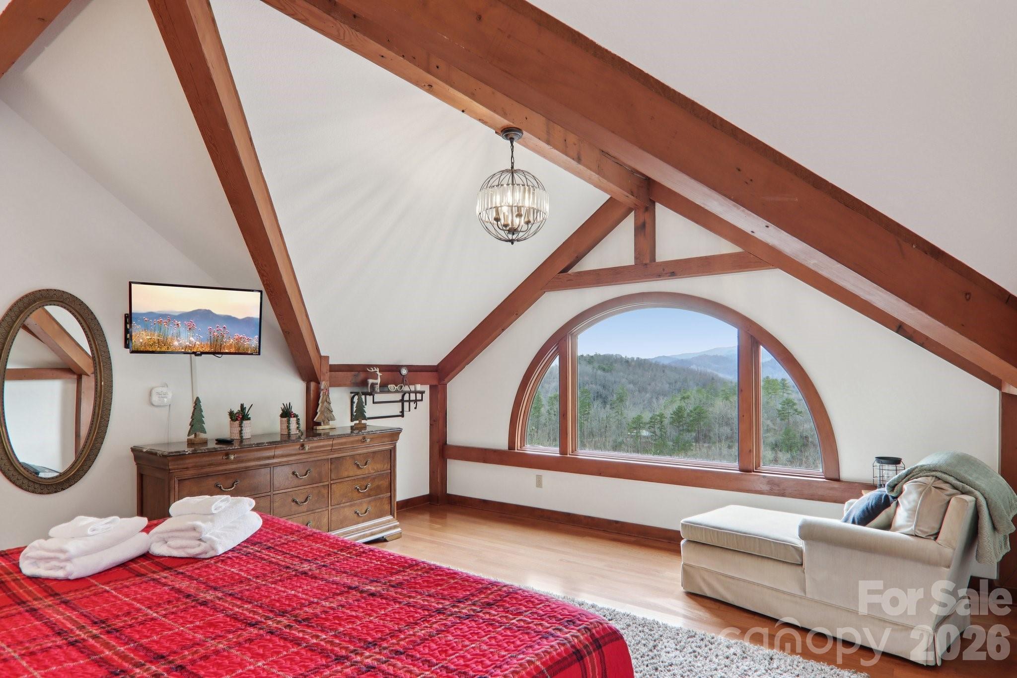 28 Nantahala Ridge Bryson City, NC 28713 - Photo 35 of 47 a bedroom with furniture and a large window