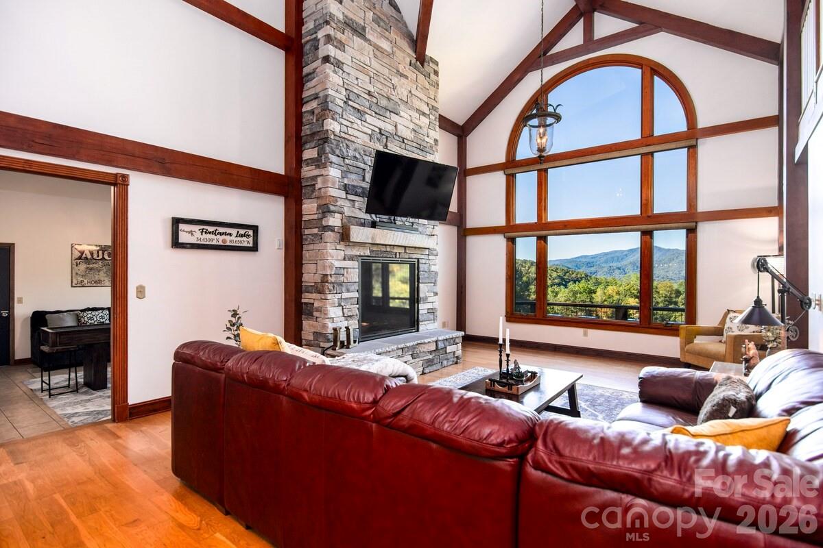 28 Nantahala Ridge Bryson City, NC 28713 - Photo 44 of 47 a living room with furniture fireplace and a large window